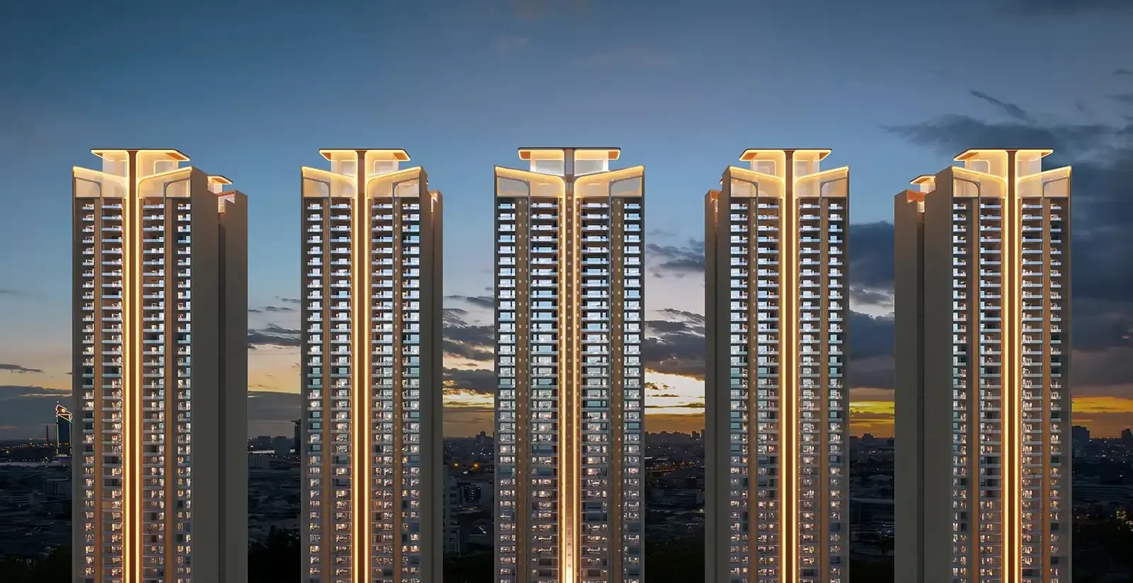 Suncity Monarch Residences five modern high-rise towers illuminated with golden vertical lighting accents at dusk